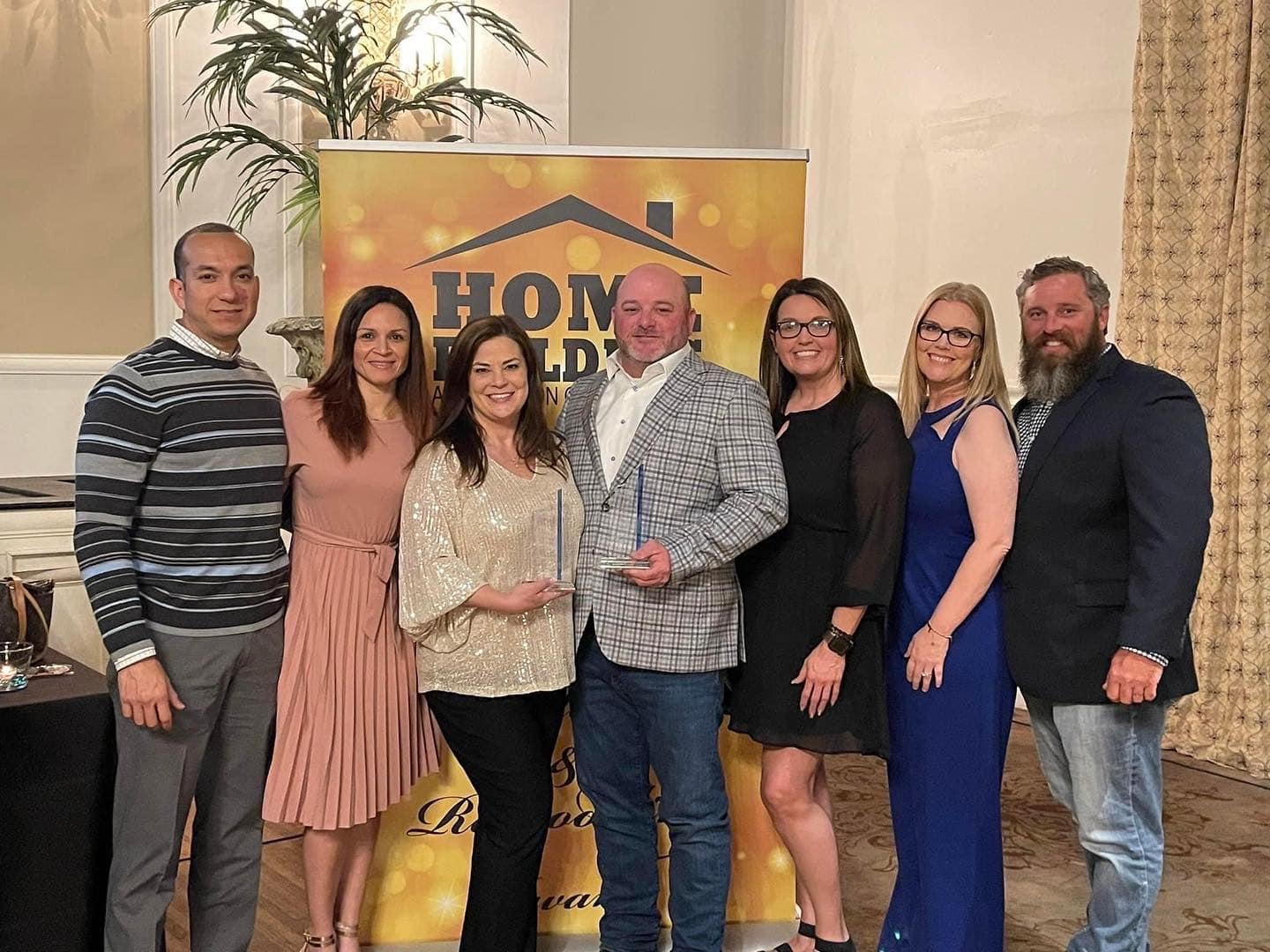 Shepard Homes Team accepting an award for best home builder